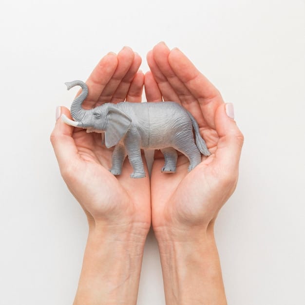 A close-up image of two hands, one holding a Republican elephant figurine and the other a Democratic donkey figurine, pulling them in opposite directions. The background is blurred, emphasizing the tug-of-war dynamic.