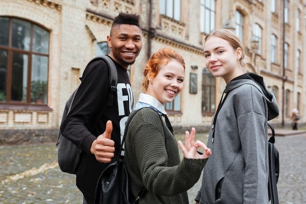A group of international students on a US college campus, smiling and interacting with each other. The image should convey a sense of diversity and opportunity.