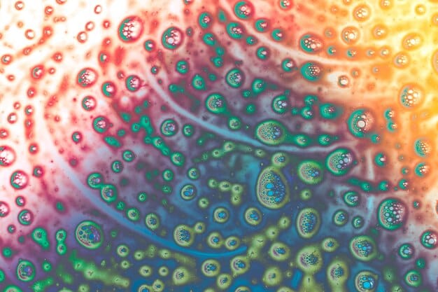 A microscopic view of cells, some highlighted in bright colors to represent senescent cells, surrounded by healthy cells. The image emphasizes the contrast between the two cell types and their interaction.