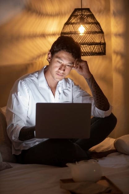 A person looking stressed at their computer screen, surrounded by multiple notifications and open tabs. The scene is dimly lit, emphasizing the feeling of overwhelm.