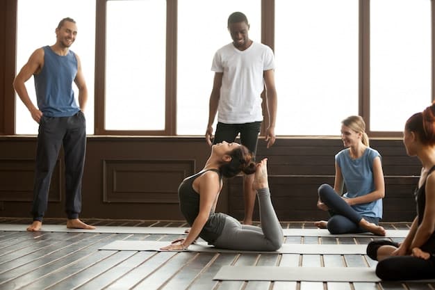 A photo of people doing yoga in a studio, showing flexibility and mindfulness as part of a comprehensive exercise approach.