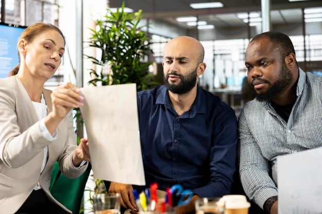 A diverse team of employees brainstorming ideas in a modern office setting, showcasing the collaborative and creative atmosphere fostered by upskilling programs.